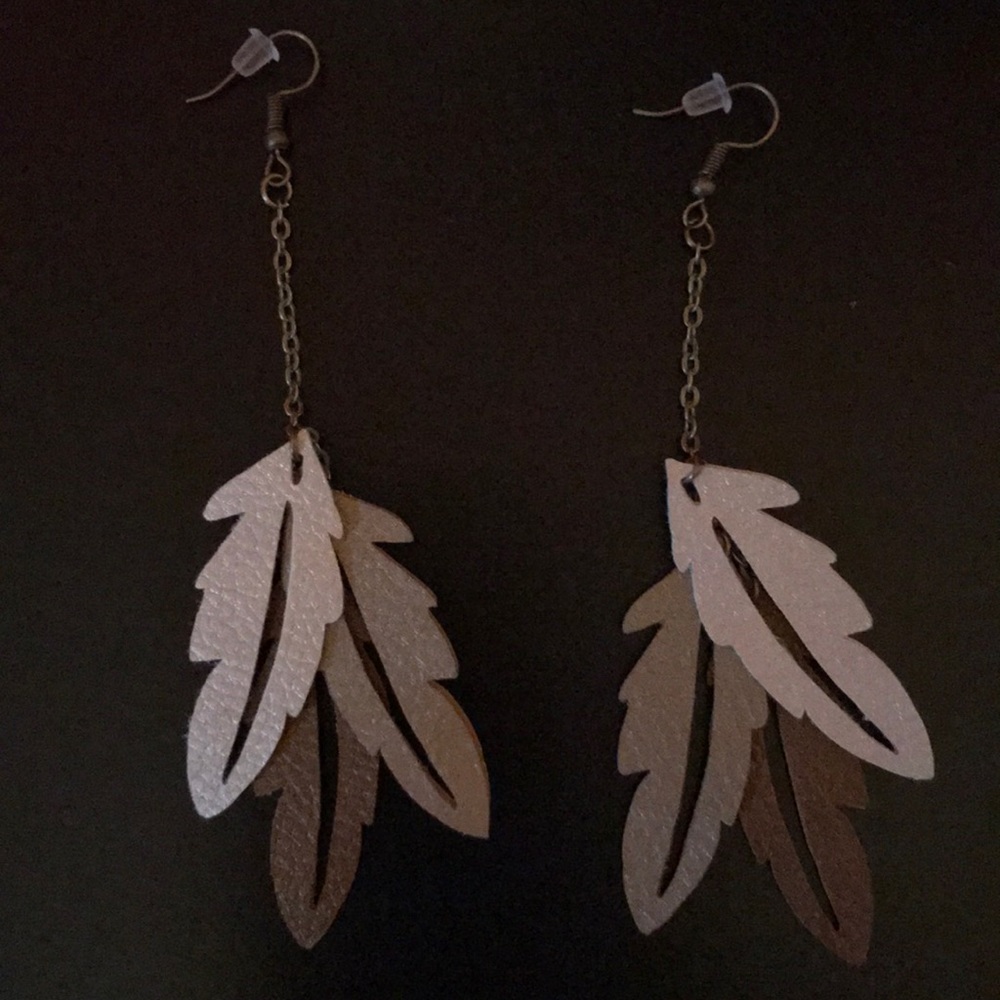 Handmade faux leather feather (🤣) shaped earrings